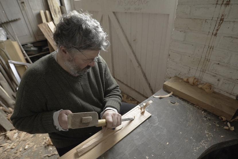 Ancient timber specialist Damian Goodburn makes a reconstruction tablet