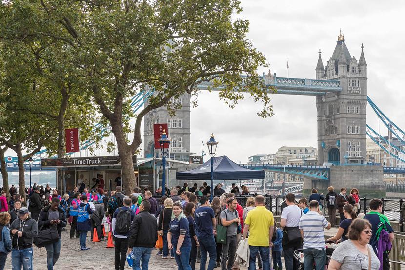 Crowd of people exploring archaeology near Tower Bridge London