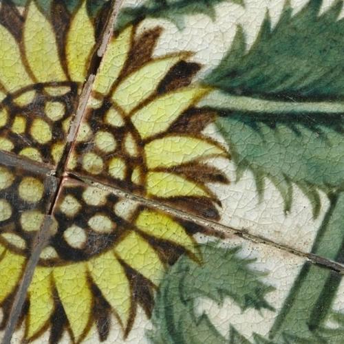 decorated tiles with a sunflower pattern