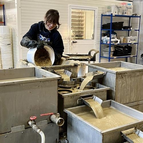 Environmental processor adding a soil sample to the wet sieving tank