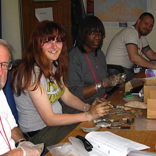 Volunteers working on animal bone
