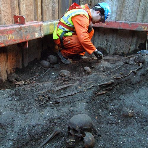 MOLA archaeologist excavating burials at Crossrail Liverpool St site