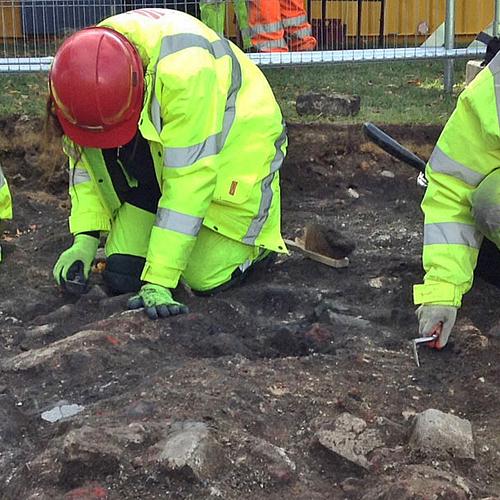 Trainee archaeologists Dunia, Janita and Abigail excavate Allen Gardens